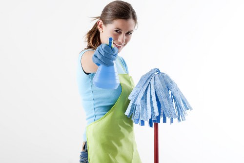 Technician preparing carpet cleaning equipment before a service appointment